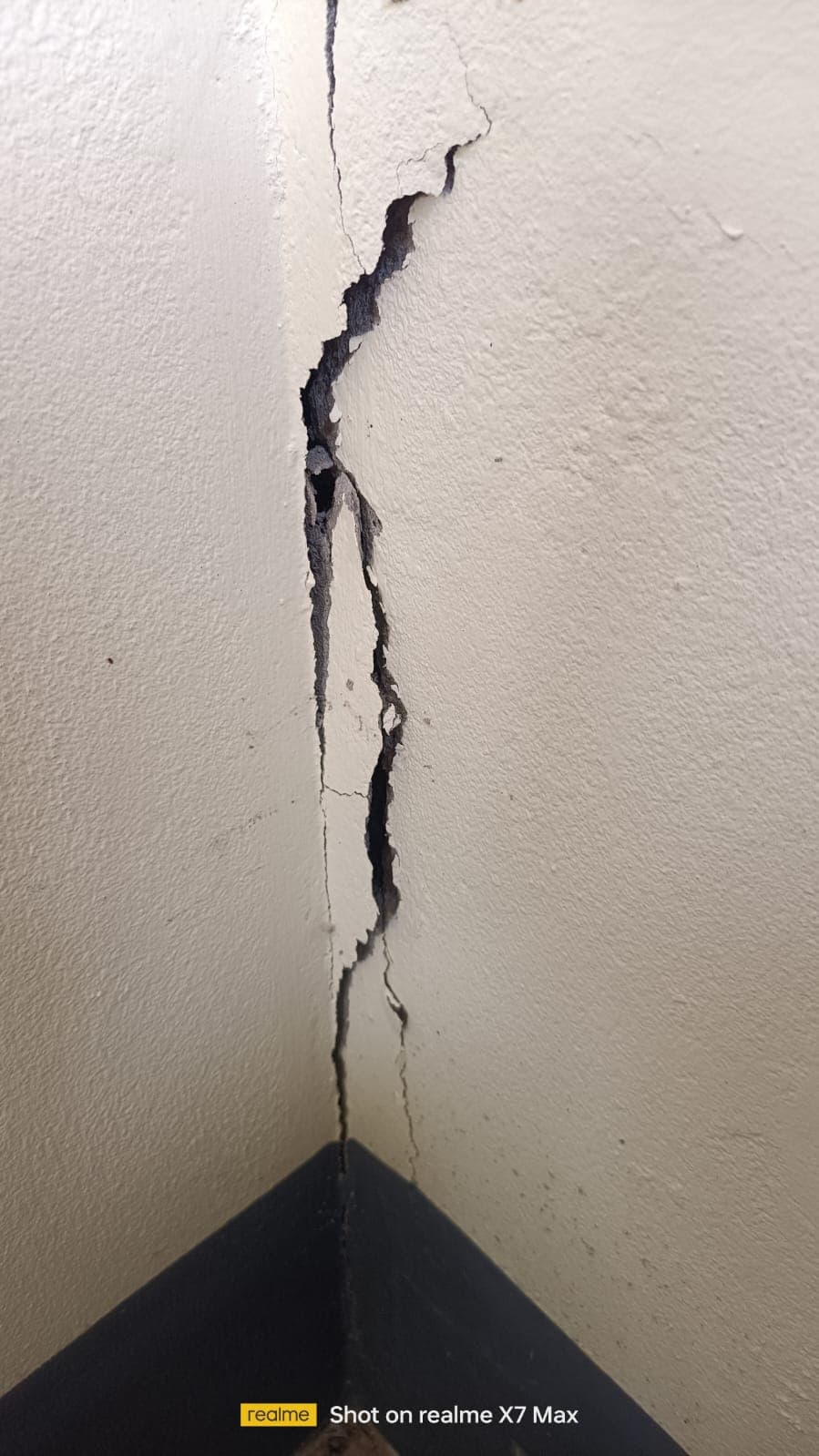 Open vertical crack at a wall corner joint · Sikkim