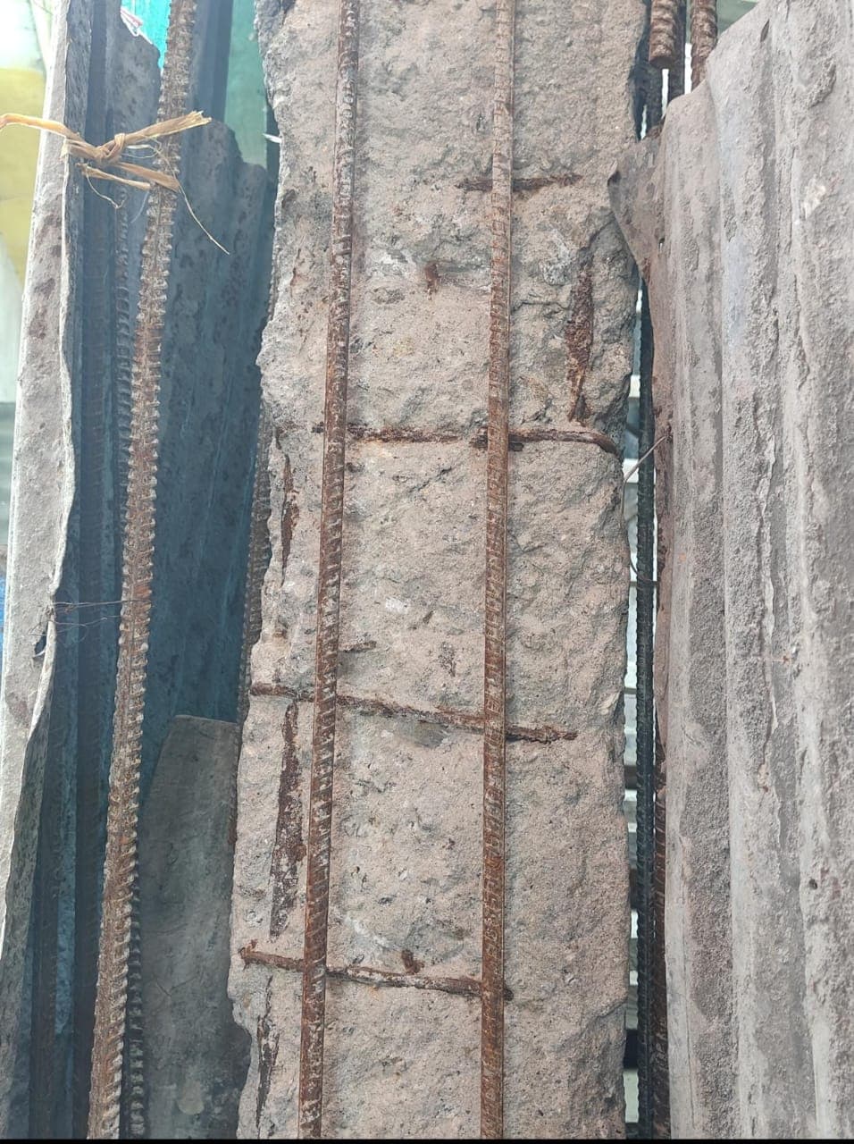 Spalled column with corroded, exposed reinforcement · Sikkim
